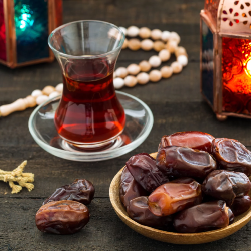 Why are dates eaten to break the fast during Ramadan?